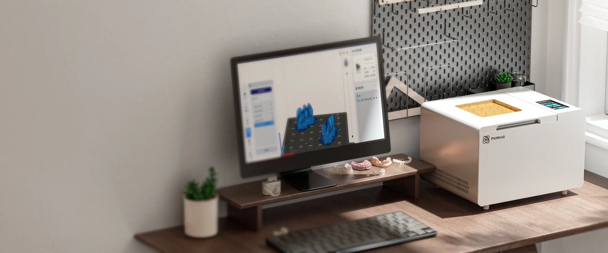 PioCreat UV02 curing equipment in a professional dental workspace