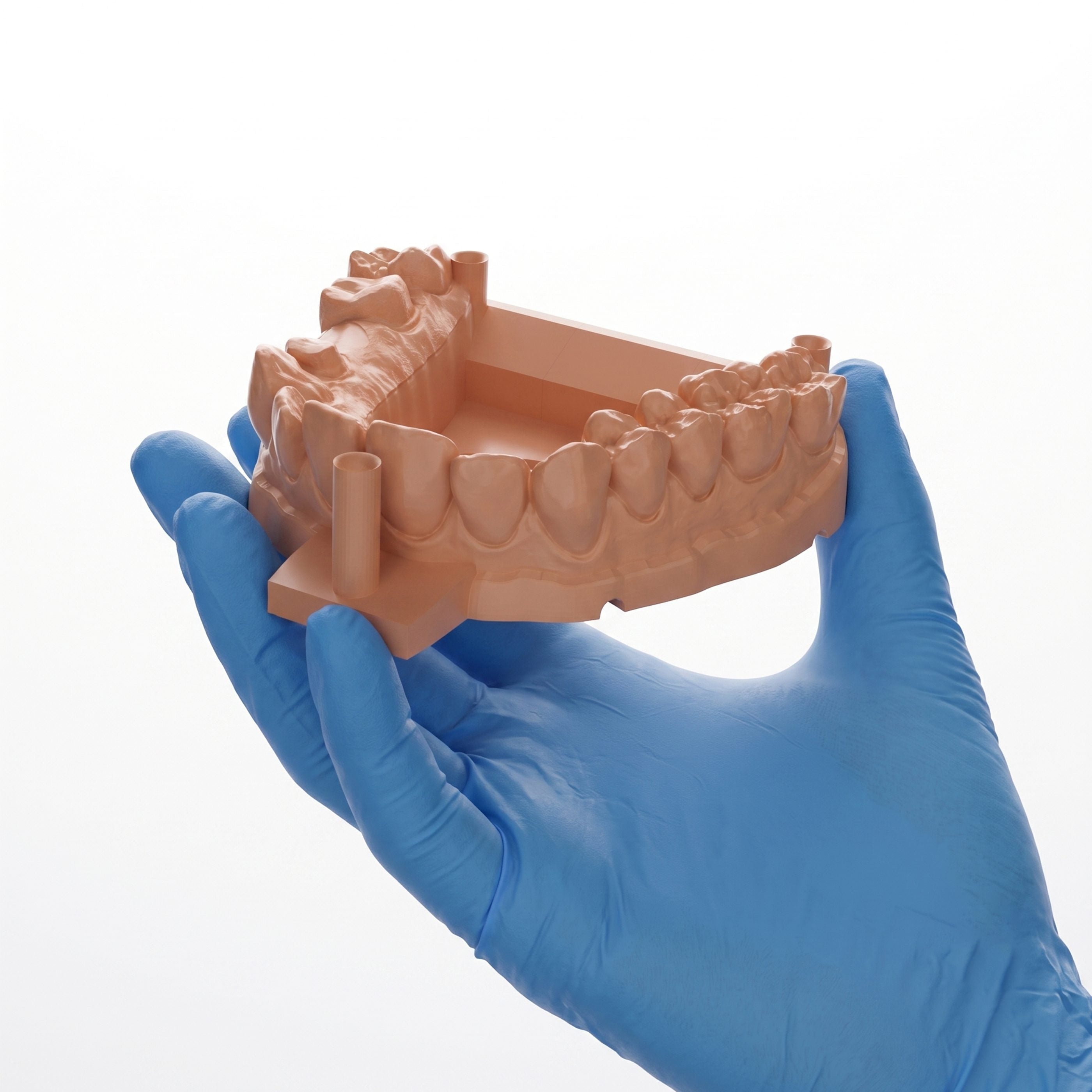 PioCreat printed dental model held for professional inspection